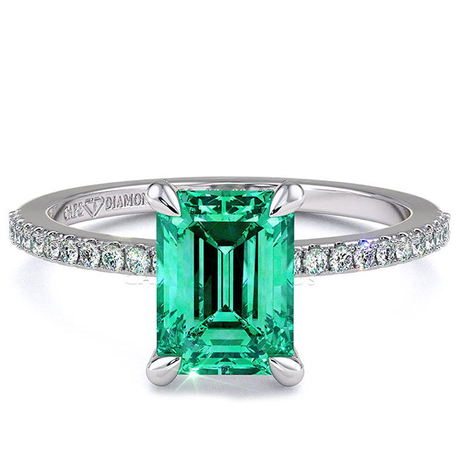 Side Stone Emerald Engagement Rings