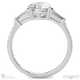 trilogy round lab grown diamond engagement ring platinum with baguette side lab grown diamonds with platinum metal and round shape diamond