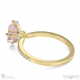 pink natural diamond low hidden halo emerald cut cross claws engagement ring yellow gold with 18k yellow gold metal and emerald shape diamond