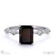 black lab grown diamond bubble drop hidden halo emerald cut engagement ring platinum with platinum metal and emerald shape diamond