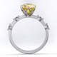 blushing bride yellow natural diamond bubble drop side stone round cut engagement ring platinum with platinum metal and round shape diamond