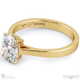 four-claw oval solitaire natural diamond engagement ring yellow gold with 9k yellow gold metal and oval shape diamond