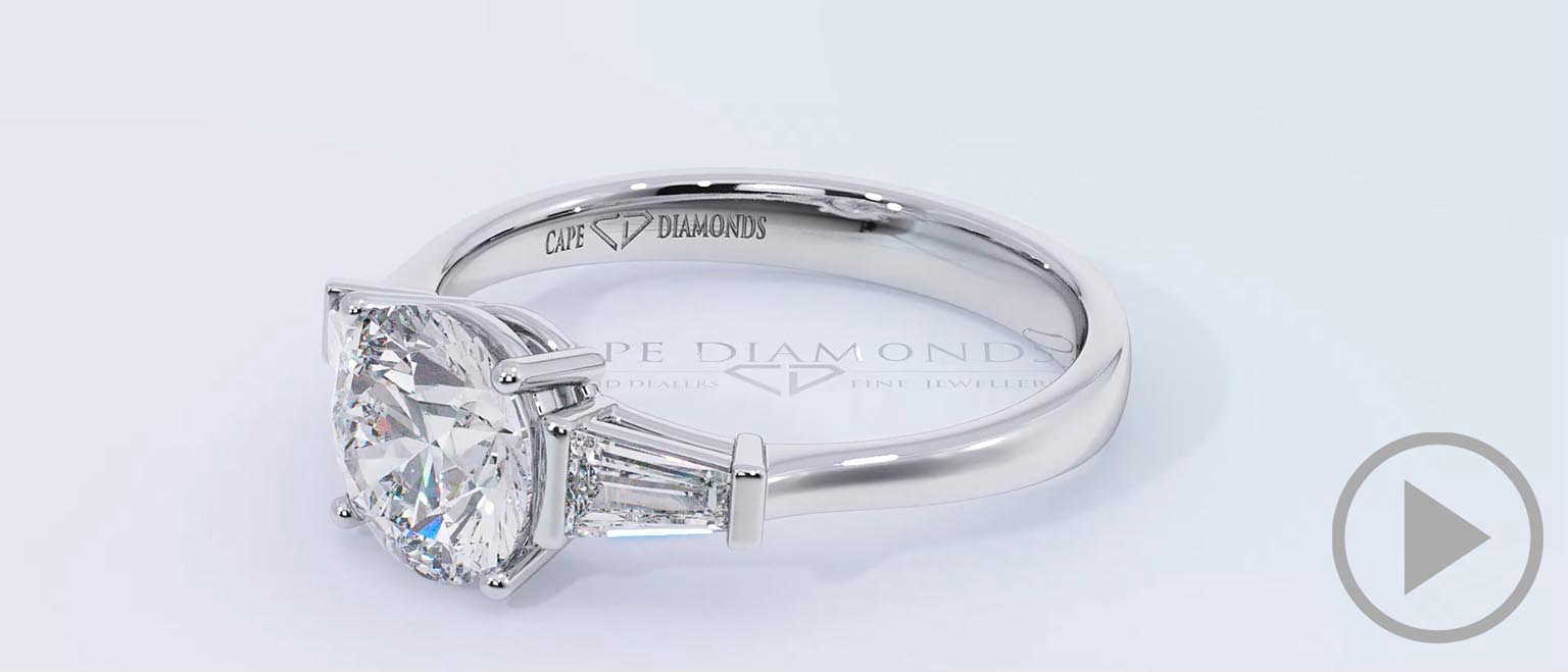 A Unique Round Natural Diamond Engagement Ring Platinum With Baguette Side Natural Diamonds top video