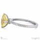 yellow lab grown diamond four claw hidden halo engagement ring platinum with platinum metal and oval shape diamond