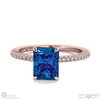 sapphire engagement ring with hidden halo and side stones rose gold with 18k rose gold metal and radiant shape diamond
