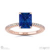 sapphire engagement ring with hidden halo and side stones rose gold with 18k rose gold metal and radiant shape diamond