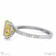 yellow natural diamond hidden halo claw set oval side stone engagement ring white gold with 18k white gold metal and oval shape diamond
