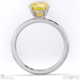 yellow lab grown diamond round solitaire claw engagement ring platinum with platinum metal and round shape diamond