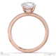 round-cut natural diamond with side stones engagement ring rose gold with 18k rose gold metal and round shape diamond