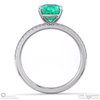 emerald cushion side stone claw engagement ring platinum with platinum metal and cushion shape diamond