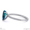 teal sapphire pear side stone claw engagement ring platinum with platinum metal and pear shape diamond