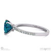 teal sapphire engagement ring with hidden halo and side stones platinum with platinum metal and heart shape diamond