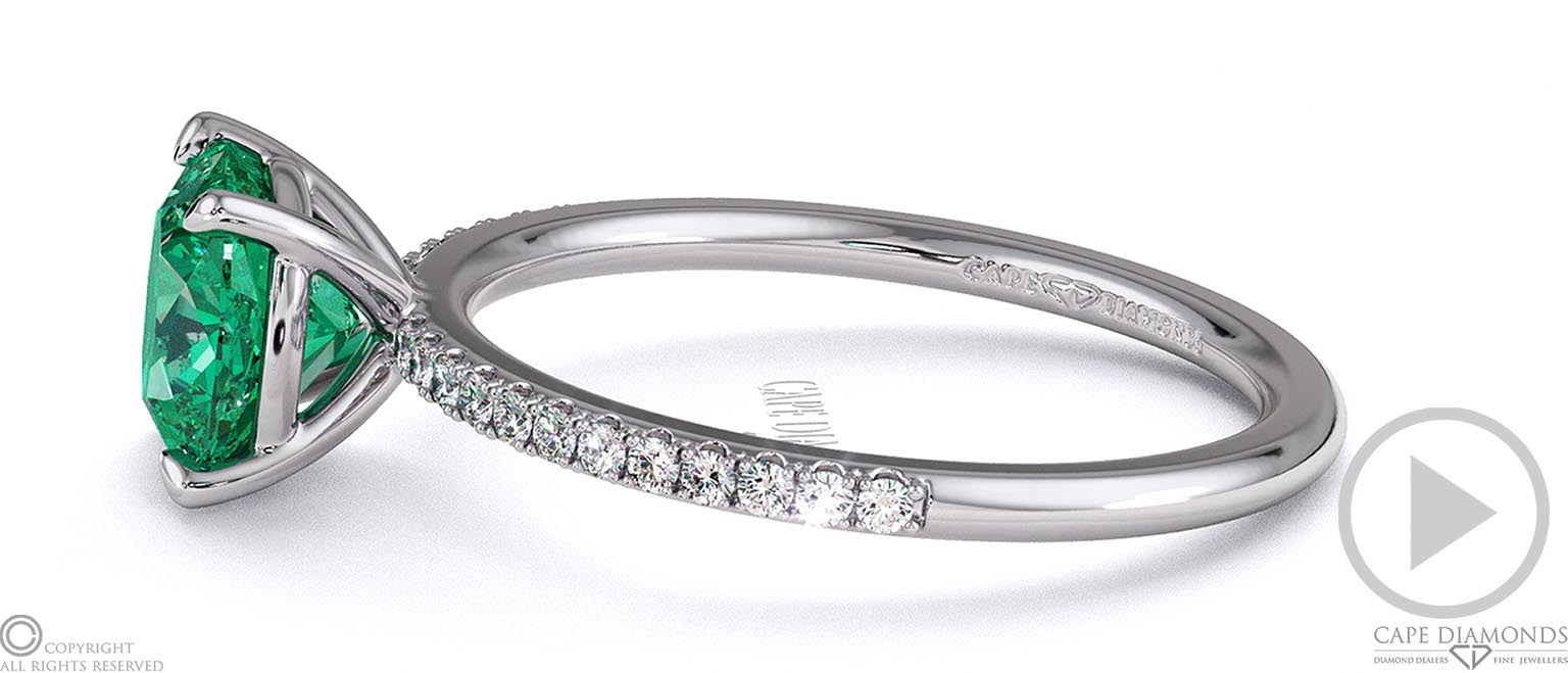 Emerald Cushion Side Stone Claw Engagement Ring Platinum top video