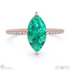emerald marquise side stone claw engagement ring rose gold with 18k rose gold metal and marquise shape diamond