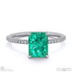 green lab grown diamond radiant side stone claw engagement ring platinum with platinum metal and radiant shape diamond