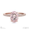 morganite engagement ring with hidden halo and side stones rose gold with 18k rose gold metal and oval shape diamond