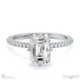 hidden halo emerald natural diamond cat claw engagement ring platinum with platinum metal and emerald shape diamond