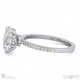 oval natural diamond chalice engagement ring platinum with a double natural diamond halo and petit side natural diamonds with platinum metal and oval shape diamond