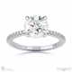 four claw hidden halo brilliant round lab grown diamond engagement ring white gold with petit pavé diamonds with 18k white gold metal and round shape diamond