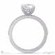 four claw hidden halo brilliant round lab grown diamond engagement ring white gold with petit pavé diamonds with 18k white gold metal and round shape diamond