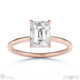 hidden halo emerald lab grown diamond engagement ring on half-rounded rose gold band with 9k rose gold metal and emerald shape diamond