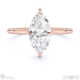 hidden halo marquise lab grown diamond engagement ring on half-rounded rose gold band with 9k rose gold metal and marquise shape diamond