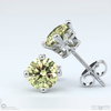 yellow diamond antique platinum earrings with platinum metal and round shape diamond