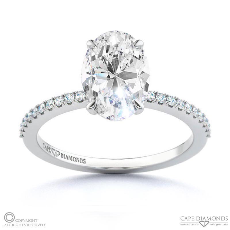 Oval Lab Grown Diamond Chalice Engagement Ring White Gold With A Double Diamond Halo And Petit Side Diamonds