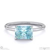 paraiba or blue tourmaline east west radiant cut solitaire engagement ring platinum with platinum metal and radiant shape diamond