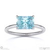 paraiba or blue tourmaline east west radiant cut solitaire engagement ring platinum with platinum metal and radiant shape diamond