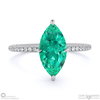 emerald marquise cut hidden halo side stones engagement ring platinum with platinum metal and marquise shape diamond