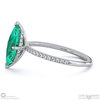 emerald marquise cut hidden halo side stones engagement ring platinum with platinum metal and marquise shape diamond