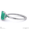 emerald radiant cut hidden halo engagement ring platinum with platinum metal and radiant shape diamond