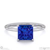 tanzanite princess cut hidden halo engagement ring platinum with platinum metal and princess shape diamond