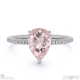 pink natural diamond pear cut hidden halo side stones engagement ring platinum with platinum metal and pear shape diamond