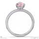 pink natural diamond pear cut hidden halo side stones engagement ring platinum with platinum metal and pear shape diamond