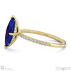 tanzanite hidden halo side stone engagement ring yellow gold with 18k yellow gold metal and marquise shape diamond