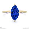 tanzanite hidden halo side stone engagement ring yellow gold with 18k yellow gold metal and marquise shape diamond