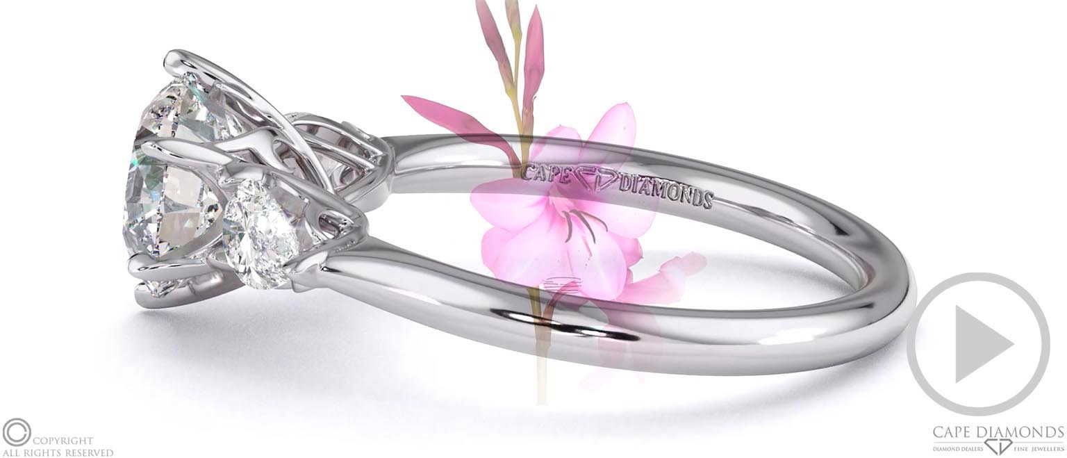 Diamond Watsonia Round Pear Trilogy Engagement Ring White Gold top video