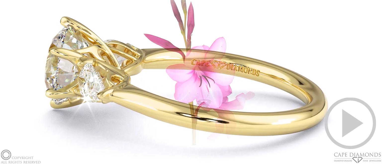 Diamond Watsonia Round Pear Trilogy Engagement Ring Yellow Gold top video