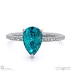 teal sapphire pear side stone claw engagement ring platinum with platinum metal and pear shape diamond