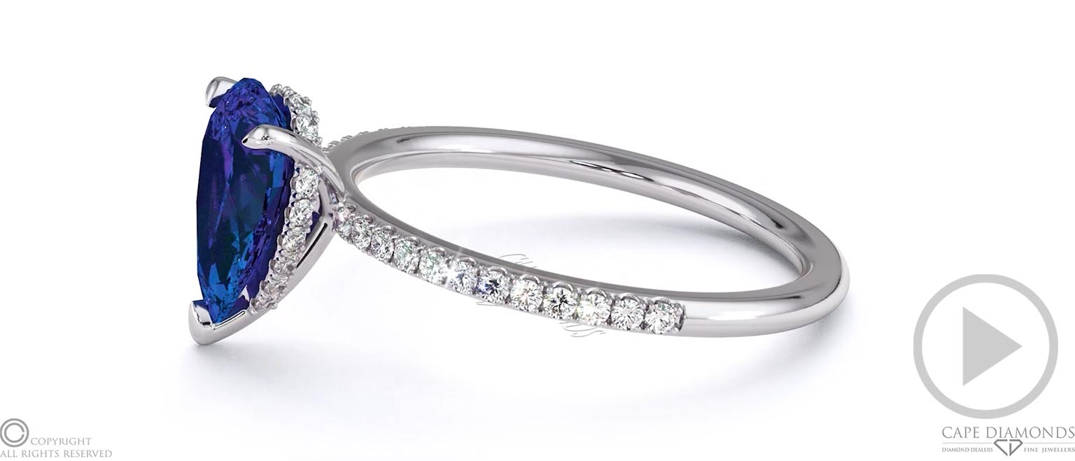 Tanzanite Pear Cut Hidden Halo Sidestones Engagement Ring White Gold top video