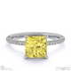 yellow lab grown diamond princess side stone claw engagement ring platinum with platinum metal and princess shape diamond