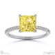 yellow lab grown diamond princess side stone claw engagement ring platinum with platinum metal and princess shape diamond