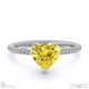 yellow lab grown diamond heart side stone claw engagement ring platinum with platinum metal and heart shape diamond