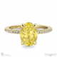 yellow lab grown diamond hidden halo oval cut claw set side stone engagement ring yellow gold with 18k yellow gold metal and oval shape diamond