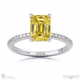 yellow natural diamond double hidden halo side stone engagement ring platinum with platinum metal and emerald shape diamond