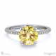 yellow natural diamond hidden halo round cut claw set side stone engagement ring white gold with 9k white gold metal and round shape diamond