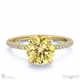 yellow natural diamond hidden halo round cut claw set side stone engagement ring yellow gold with 18k yellow gold metal and round shape diamond