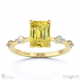 yellow lab grown diamond bubble drop side stone hidden halo emerald cut engagement ring yellow gold with 9k yellow gold metal and emerald shape diamond